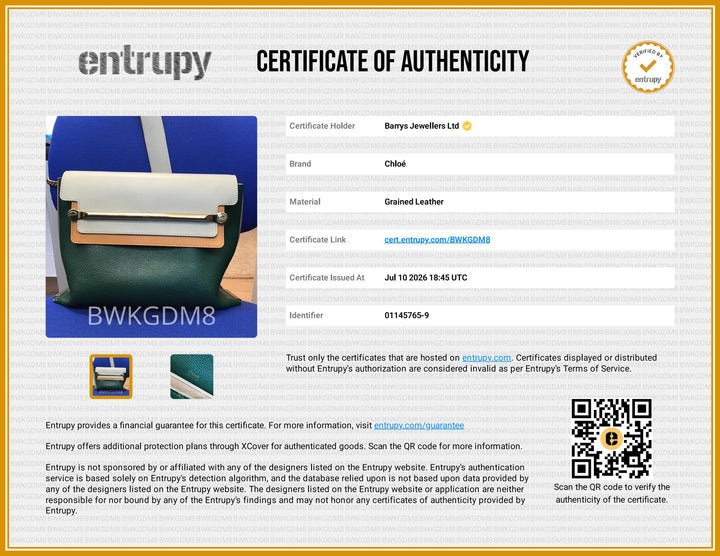 A certificate of authenticity document for Barrys Jewellers Ltd, featuring a blue and black leather roller tool, a small leather sample swatch, and a QR code on a white and gold background. The brand 'Entrupy' is clearly visible at the top.
