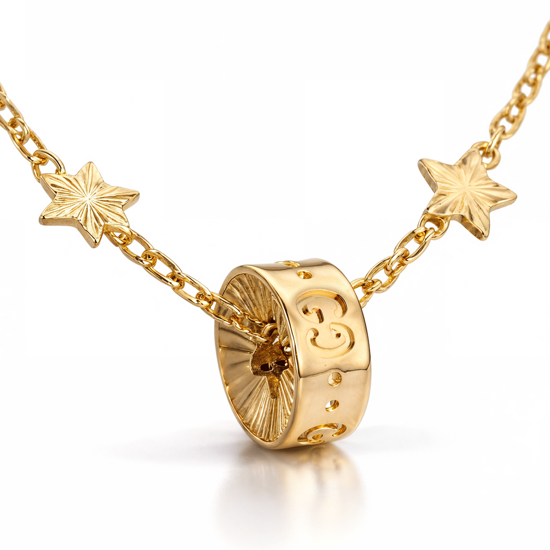 18kt Yellow Gold Bracelet with Stars & Rolling Icon Charm