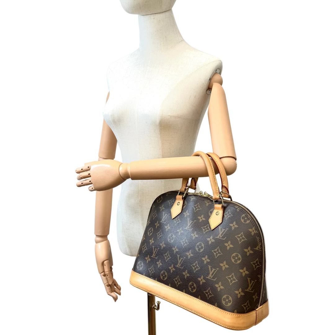 Monogram Canvas Alma MM Handbag
