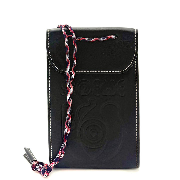 A black leather phone pouch with an embossed circular logo on the front, featuring a red and blue braided strap and a small tassel, shown against a plain white background.