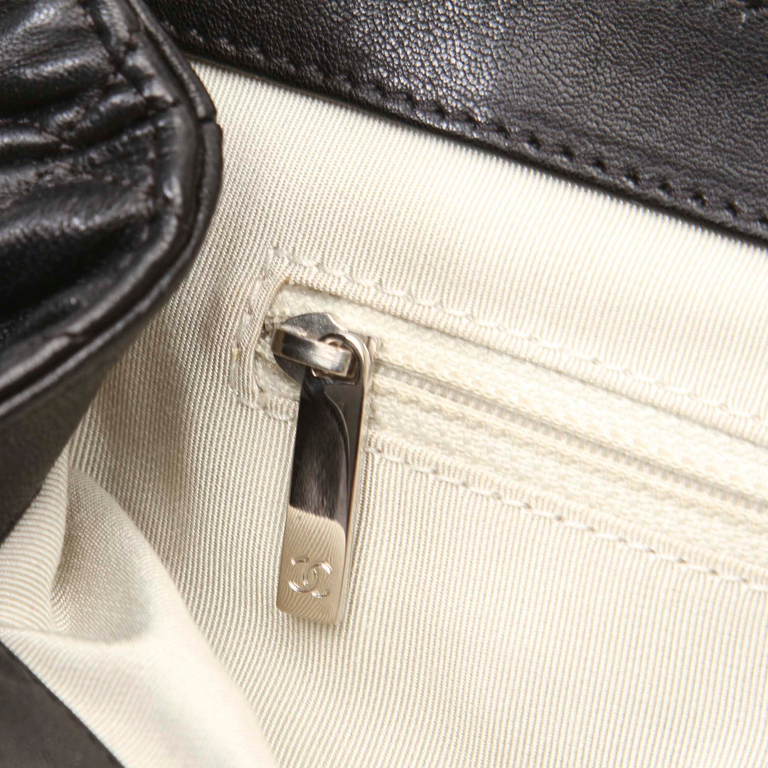 chain around large lambskin leather messenger bag