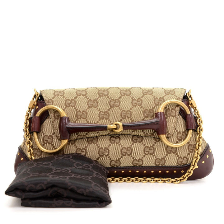 monogram canvas horsebit clutch bag