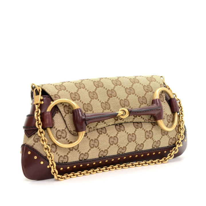 monogram canvas horsebit clutch bag