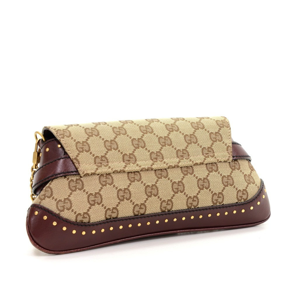 monogram canvas horsebit clutch bag