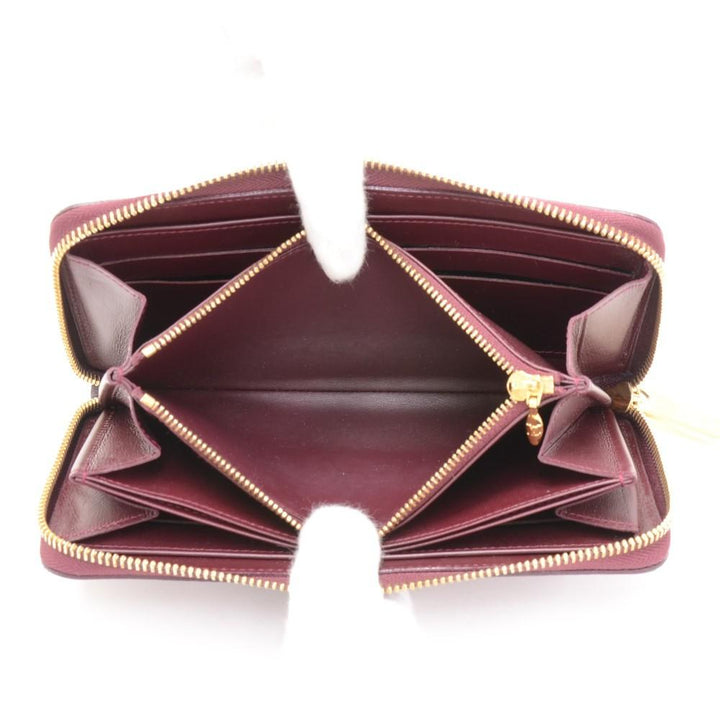 zippy monogram vernis leather wallet