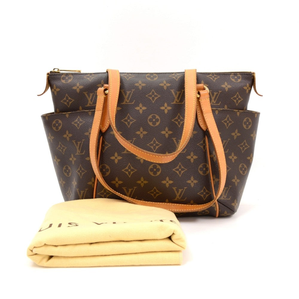 totally pm monogram canvas handbag