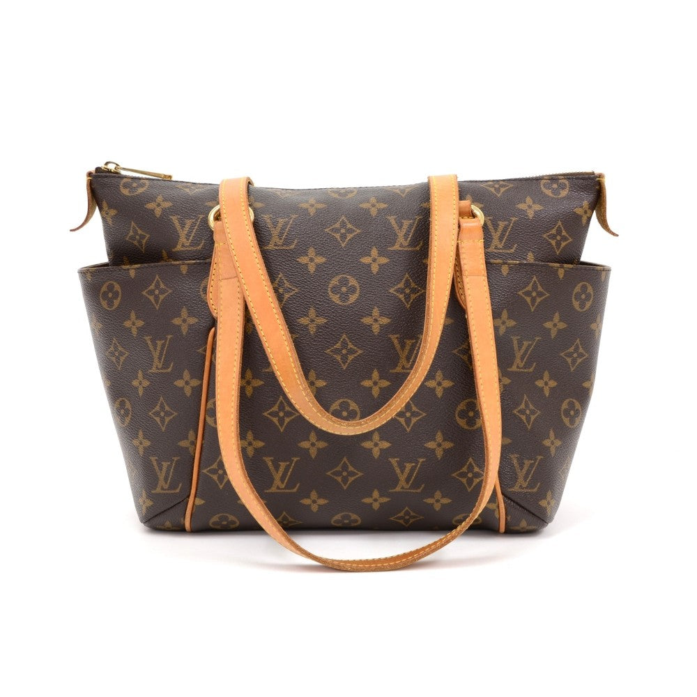 totally pm monogram canvas handbag