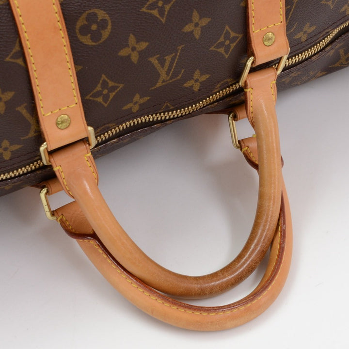monogram canvas keepall 55 bandouliere duffel bag with strap