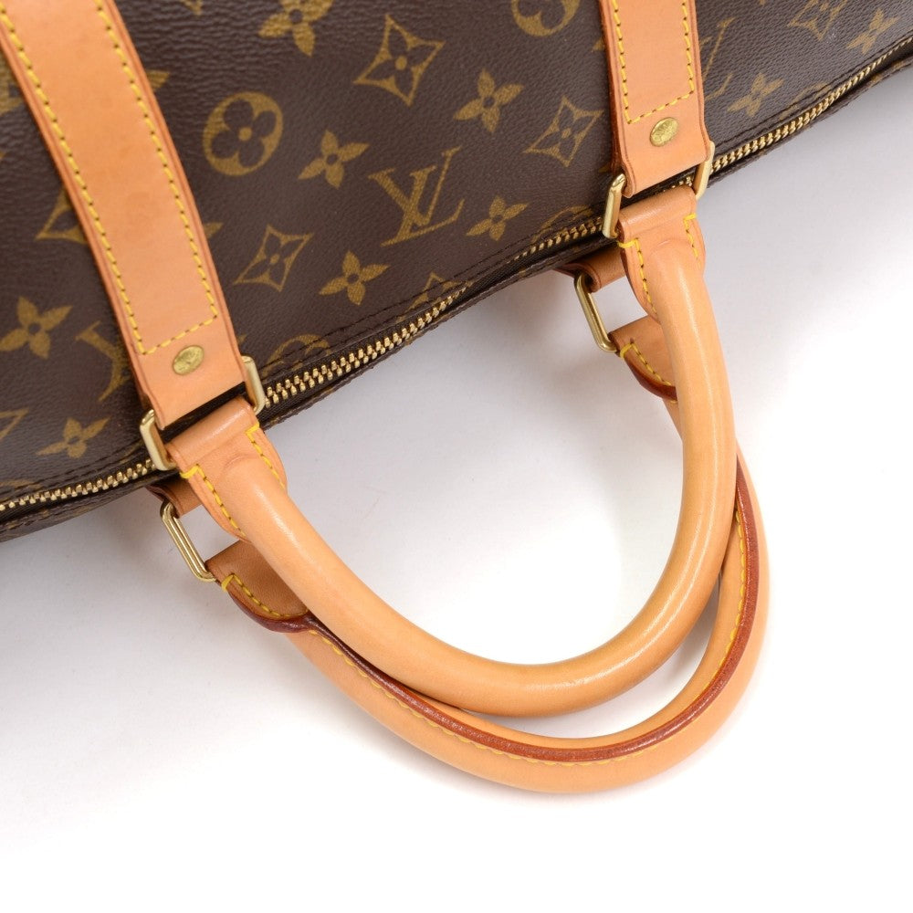 monogram canvas keepall 55 bandouliere duffel bag with strap