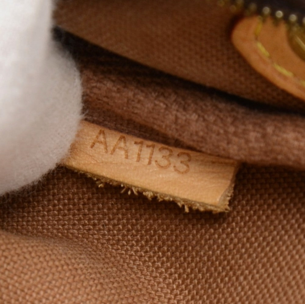 eva monogram canvas evening bag with strap