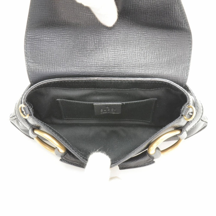 textured leather horsebit bag