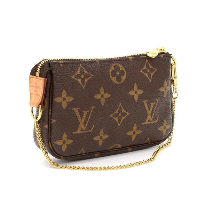 mini pochette accessoires monogram canvas evening bag