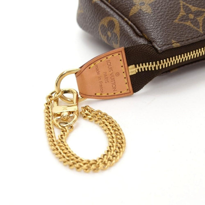 mini pochette accessoires monogram canvas evening bag