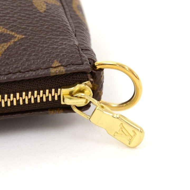 mini pochette accessoires monogram canvas evening bag