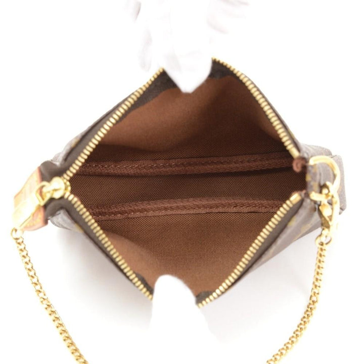 mini pochette accessoires monogram canvas evening bag