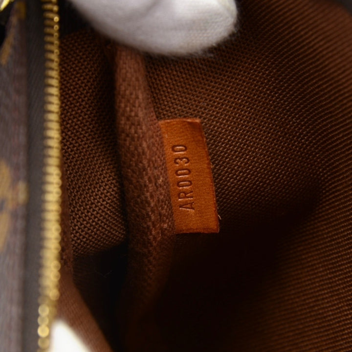 pochette accessoires monogram canvas evening bag