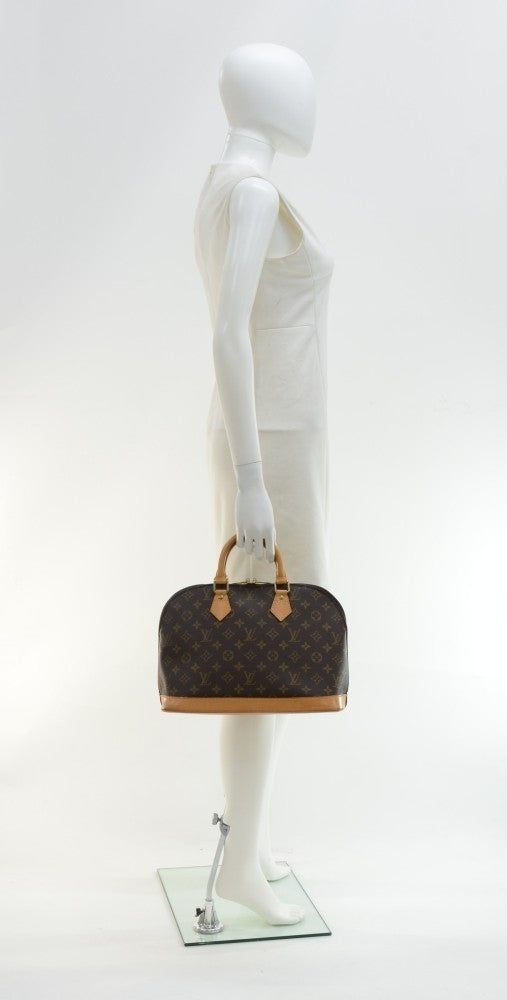 alma monogram canvas handbag