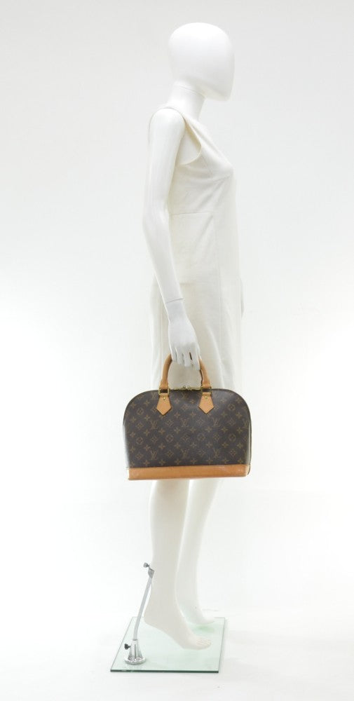 alma monogram canvas handbag