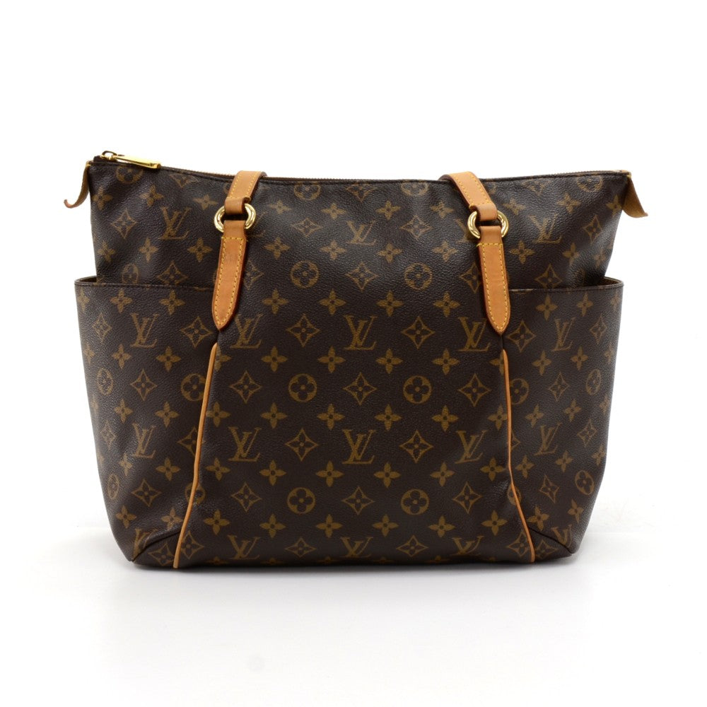 totally pm monogram canvas shoulder bag