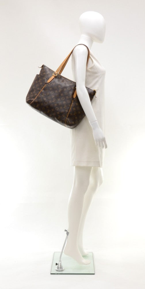 totally pm monogram canvas shoulder bag