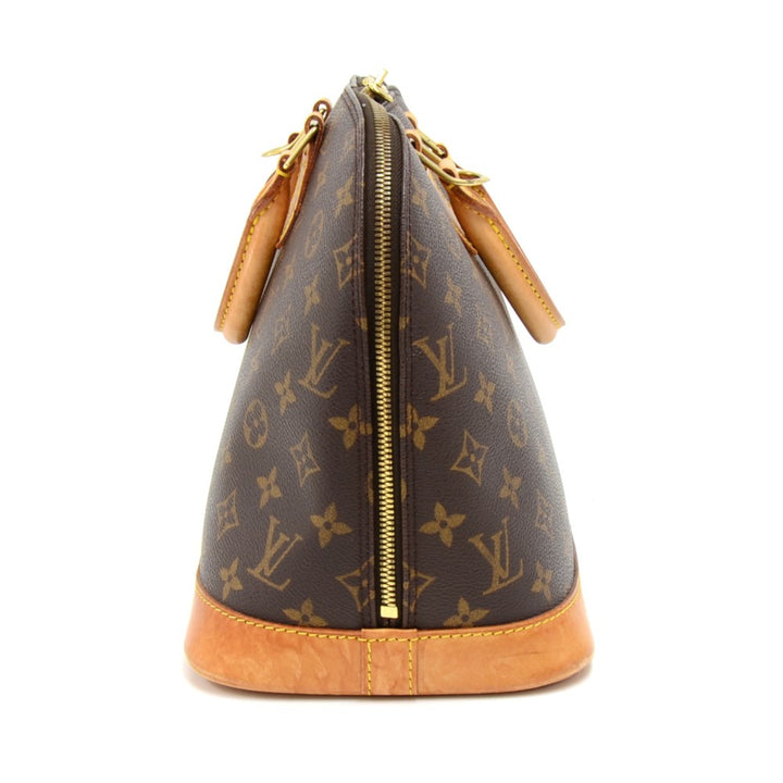 alma monogram canvas handbag with strap