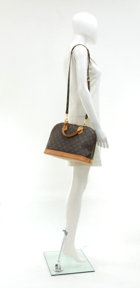 alma monogram canvas handbag with strap