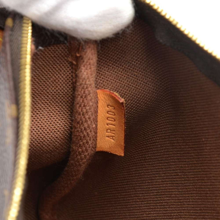 pochette accessoires monogram canvas evening bag