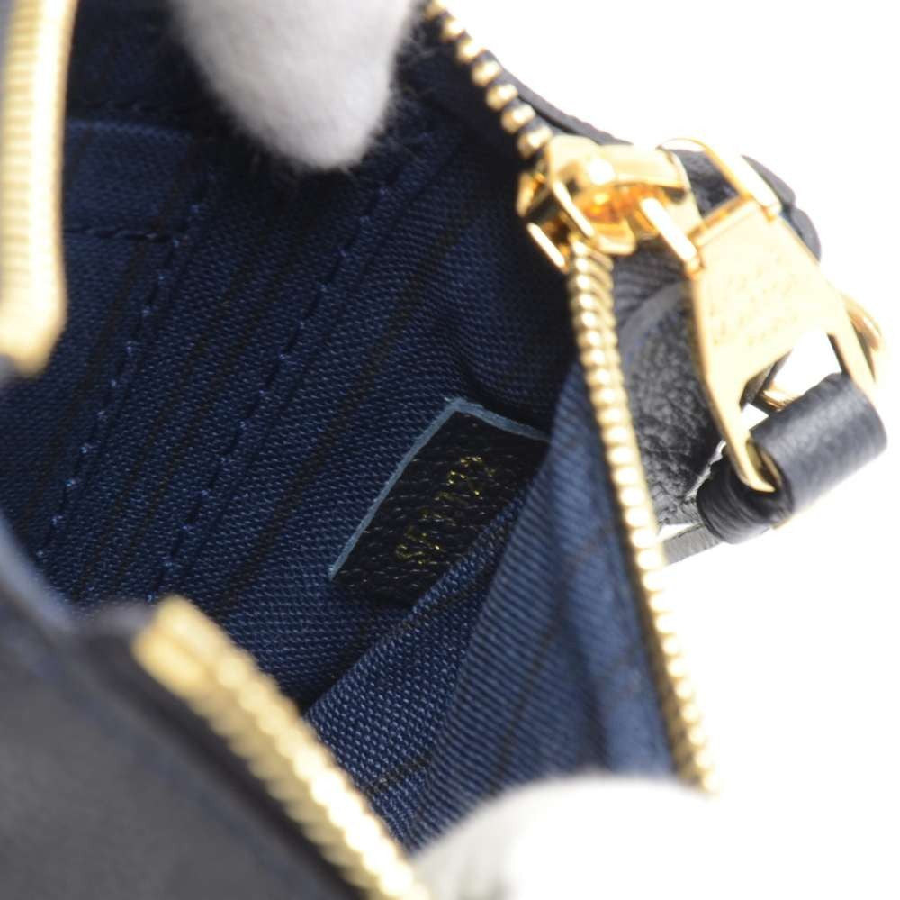 citadine empreinte leather pochette bag