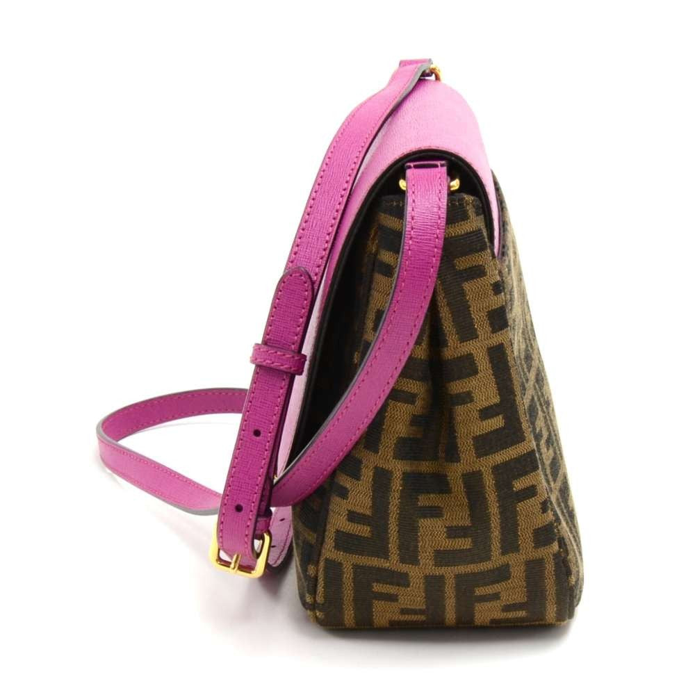 monogram canvas and fuschia leather crossbody bag