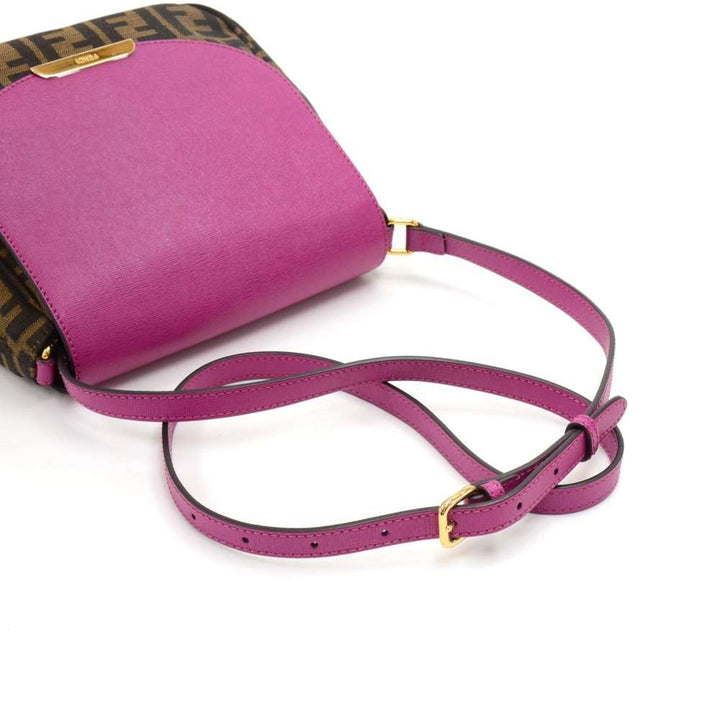 monogram canvas and fuschia leather crossbody bag