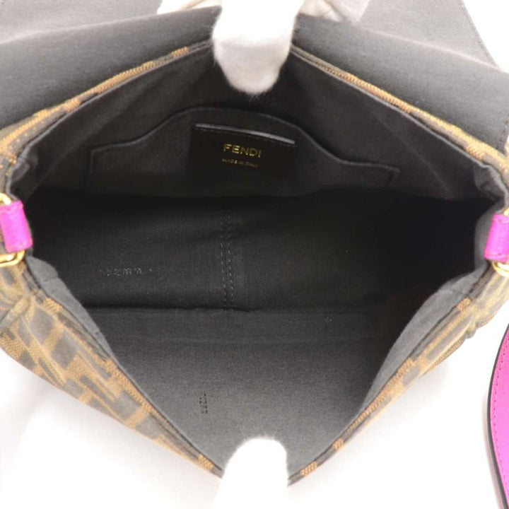 monogram canvas and fuschia leather crossbody bag