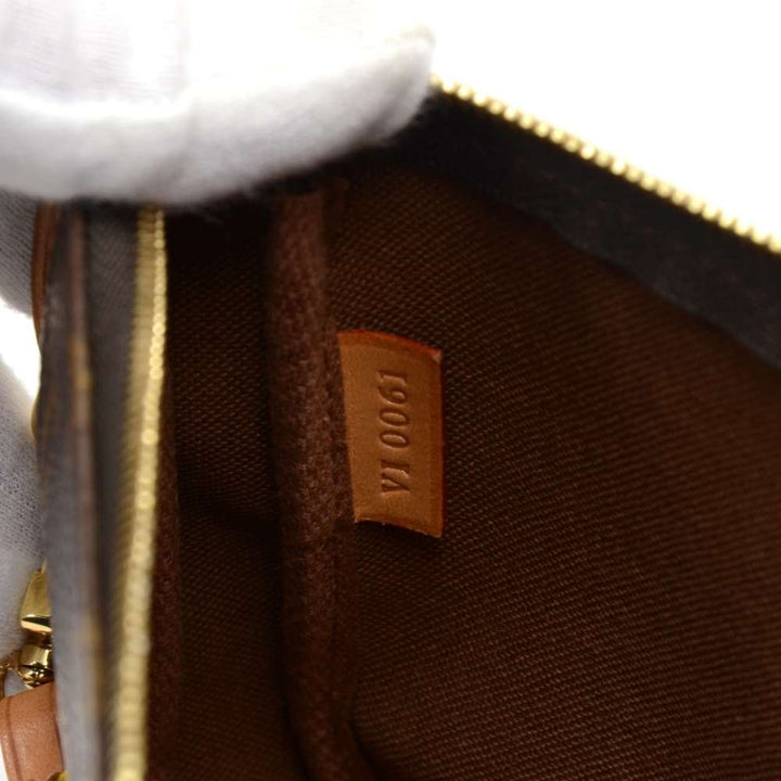 pochette accessoires monogram canvas evening bag