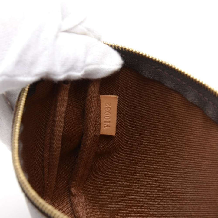 pochette accessoires monogram canvas evening bag