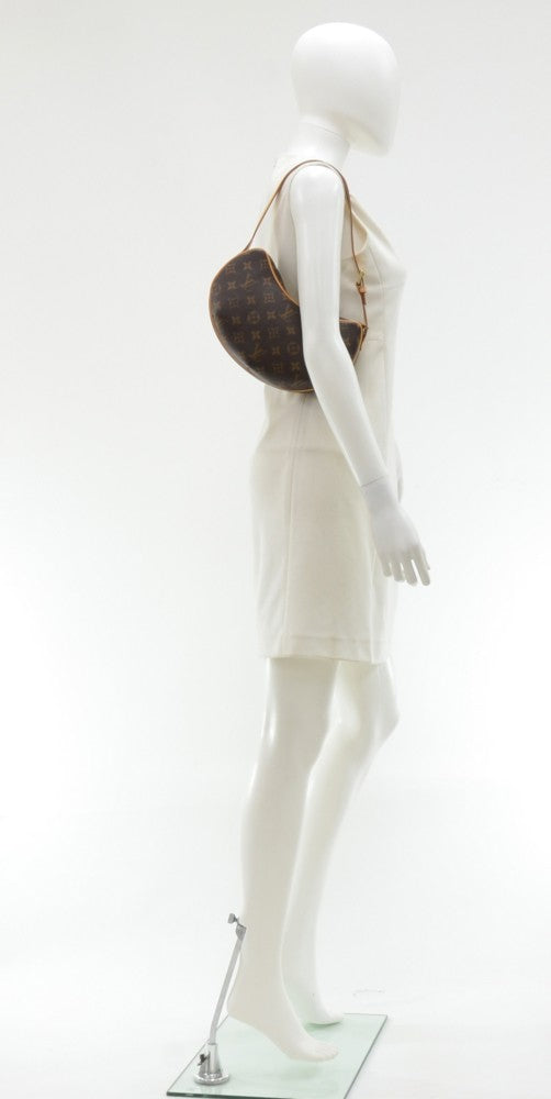 pochette croissant monogram canvas handbag