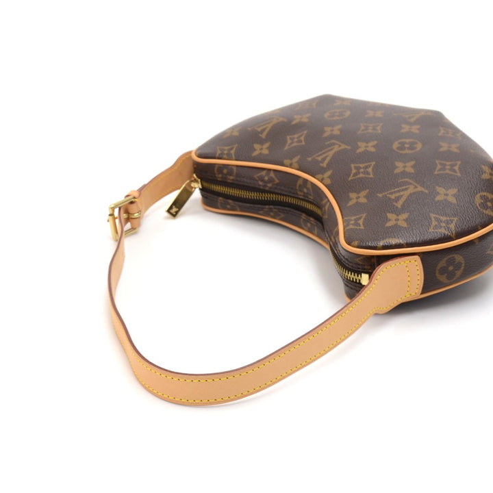 pochette croissant monogram canvas handbag