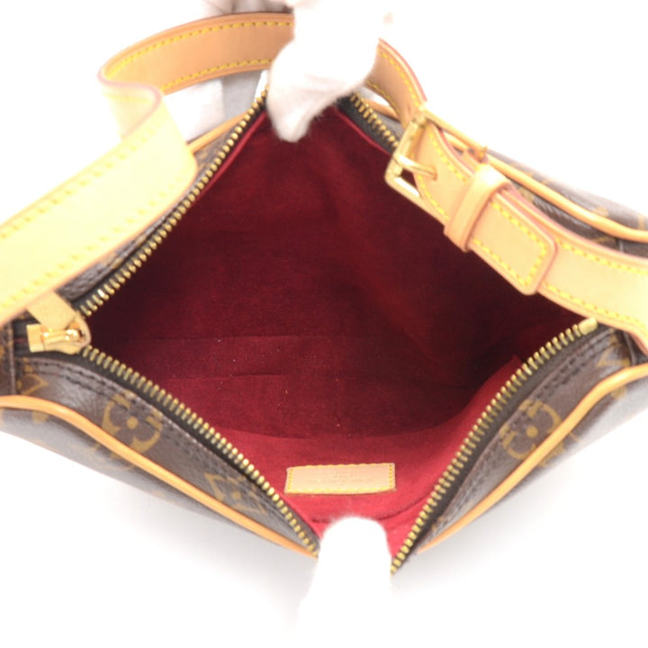 pochette croissant monogram canvas handbag