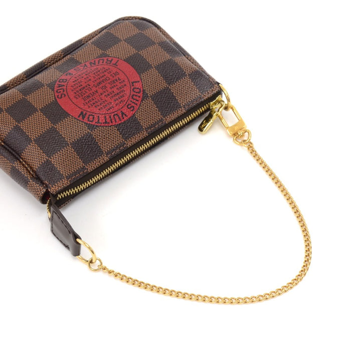 pochette accessoires trunks & bags damier canvas mini bag