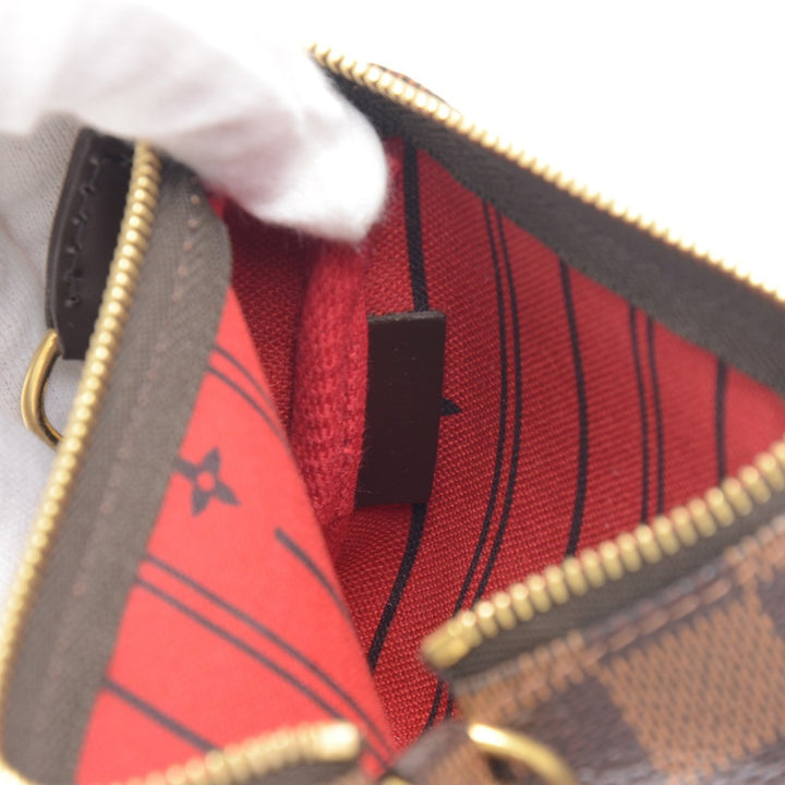 pochette accessoires trunks & bags damier canvas mini bag