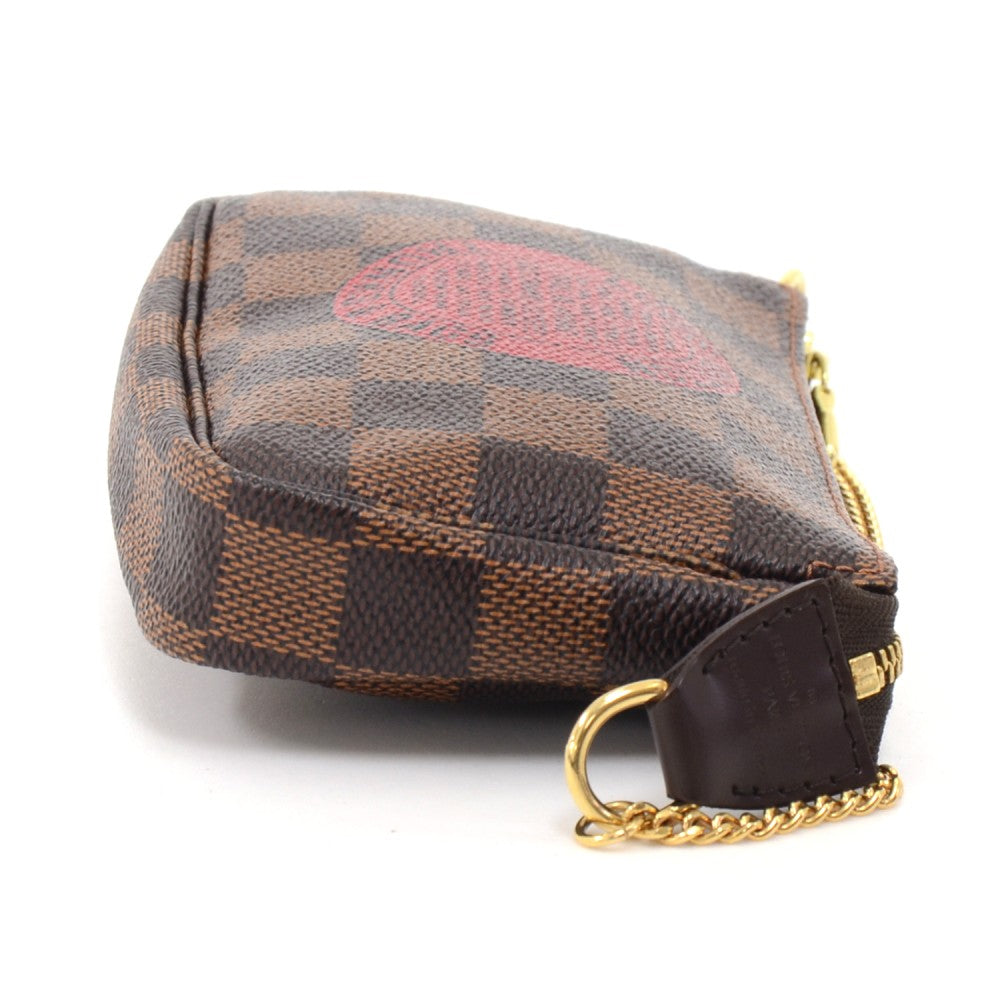 pochette accessoires trunks & bags damier canvas mini bag