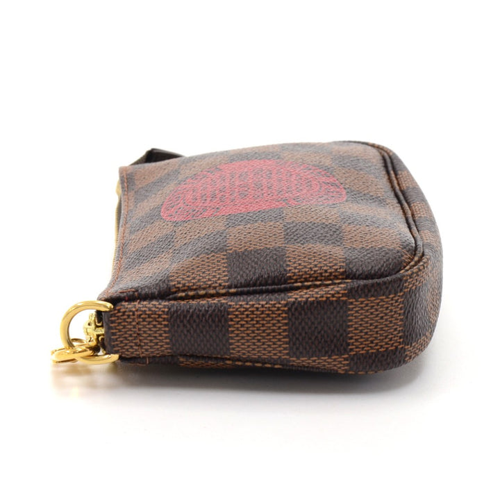 pochette accessoires trunks & bags damier canvas mini bag