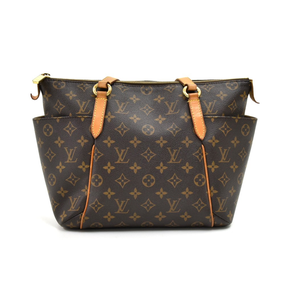 totally pm monogram canvas bag