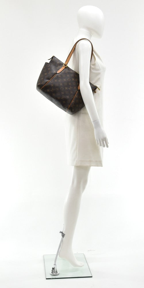 totally pm monogram canvas bag