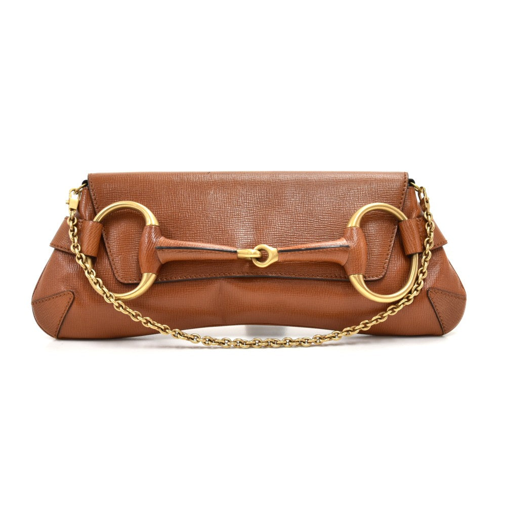 textured leather horsebit evening bag