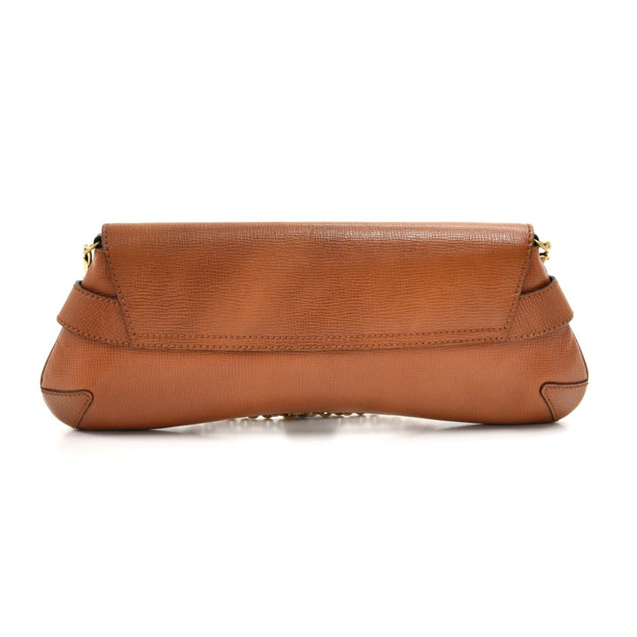 textured leather horsebit evening bag