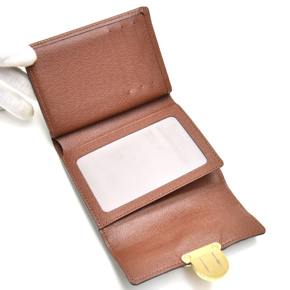 portefeuille koala trifold monogram canvas wallet