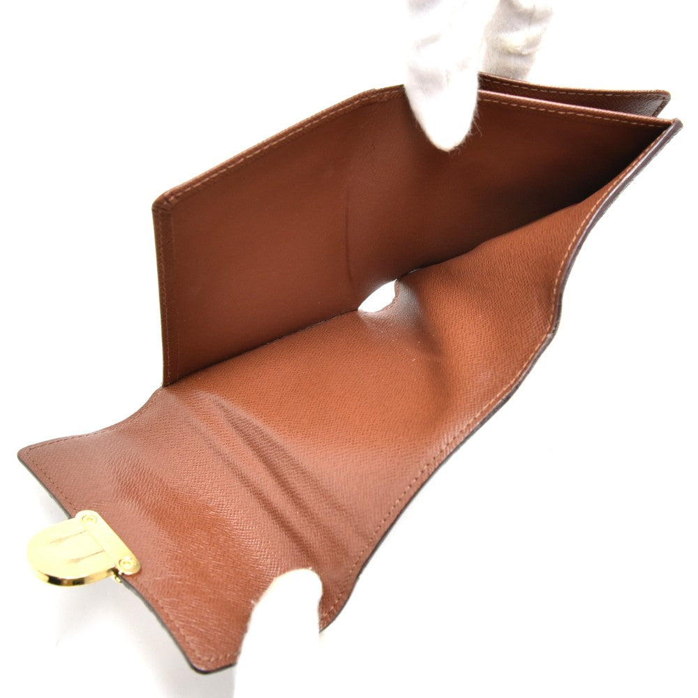 portefeuille koala trifold monogram canvas wallet