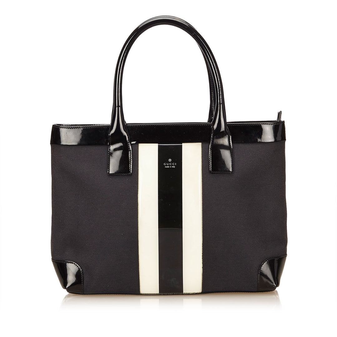 canvas and patent leather striped tote bag