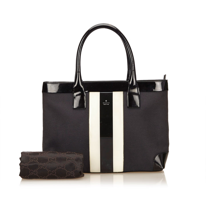 canvas and patent leather striped tote bag