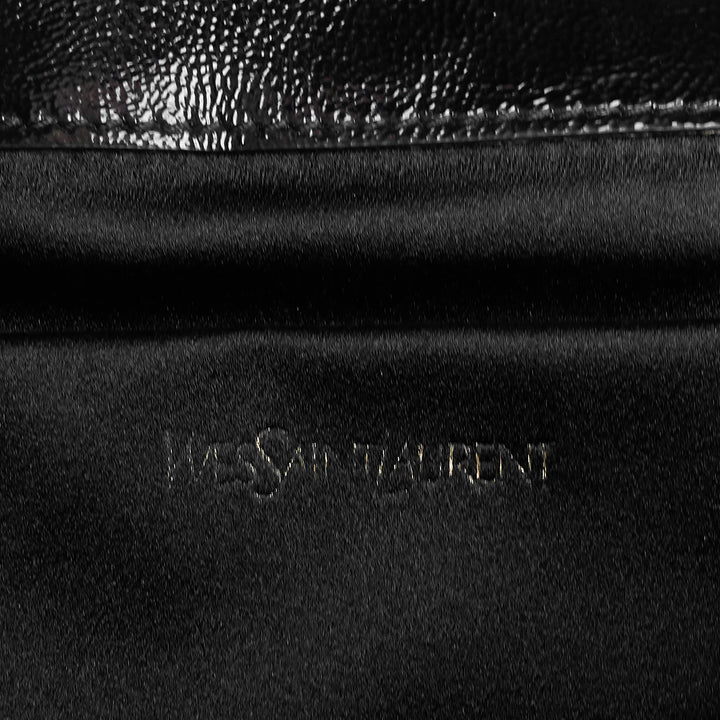 belle de jour patent leather clutch bag