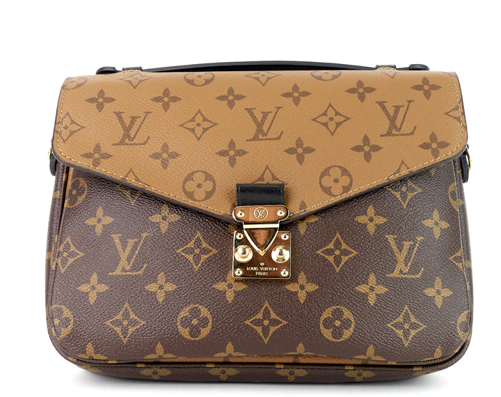 pochette metis reverse monogram canvas bag